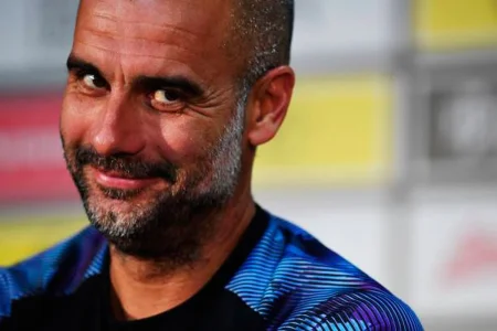 Pep Guardiola sorridente